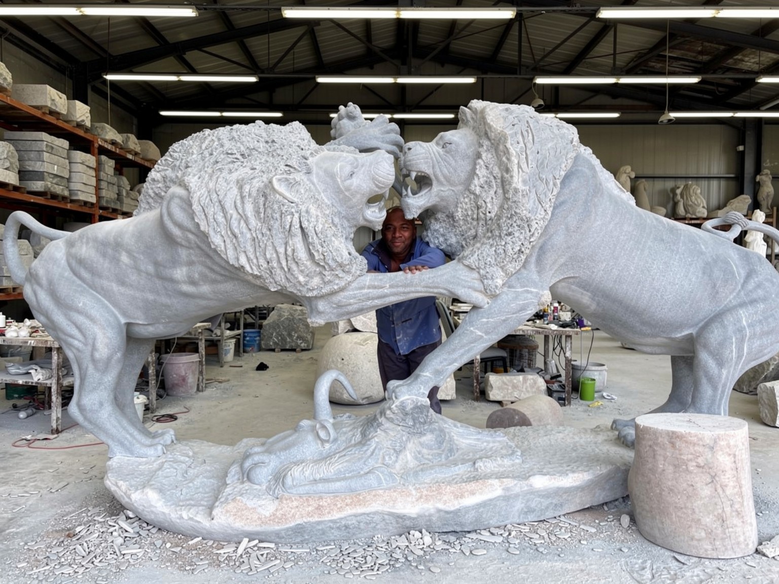 Fighting Lions sculpture in progress and completed in the Tandi workshop